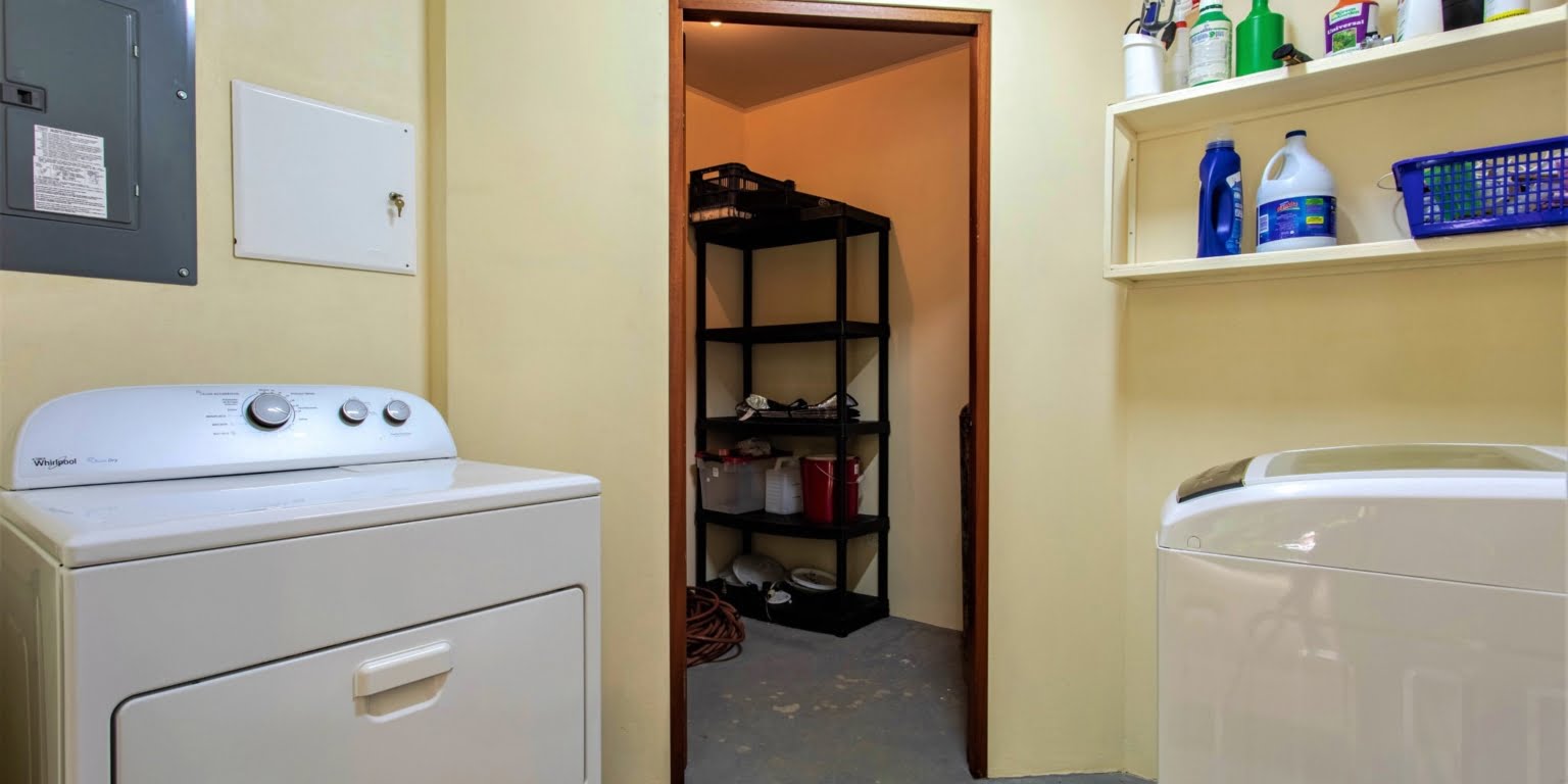 32. Laundry Room Two-Bedroom Jungle View Home in Gated Community with Community Waterfall & Pool in Tres Rios Costa Rica