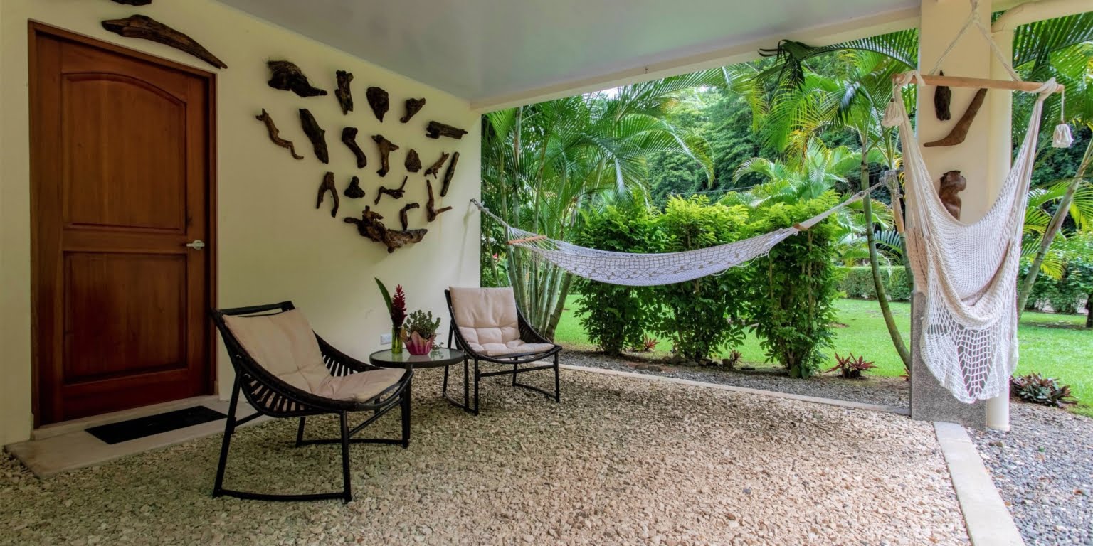 30. Lower Seating Area Two-Bedroom Jungle View Home in Gated Community with Community Waterfall & Pool in Tres Rios Costa Rica