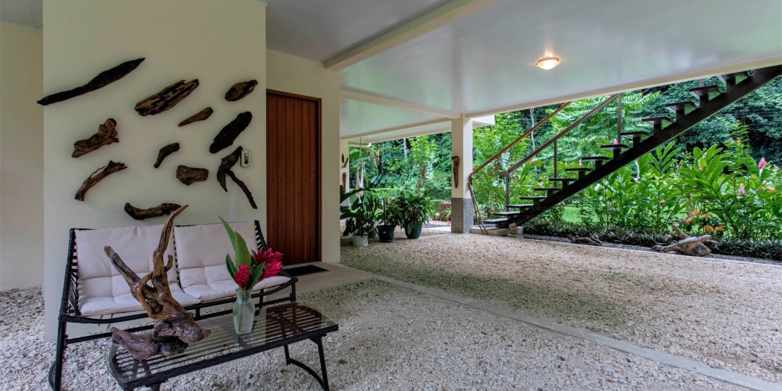 28. Lower Seating Area Two-Bedroom Jungle View Home in Gated Community with Community Waterfall & Pool in Tres Rios Costa Rica