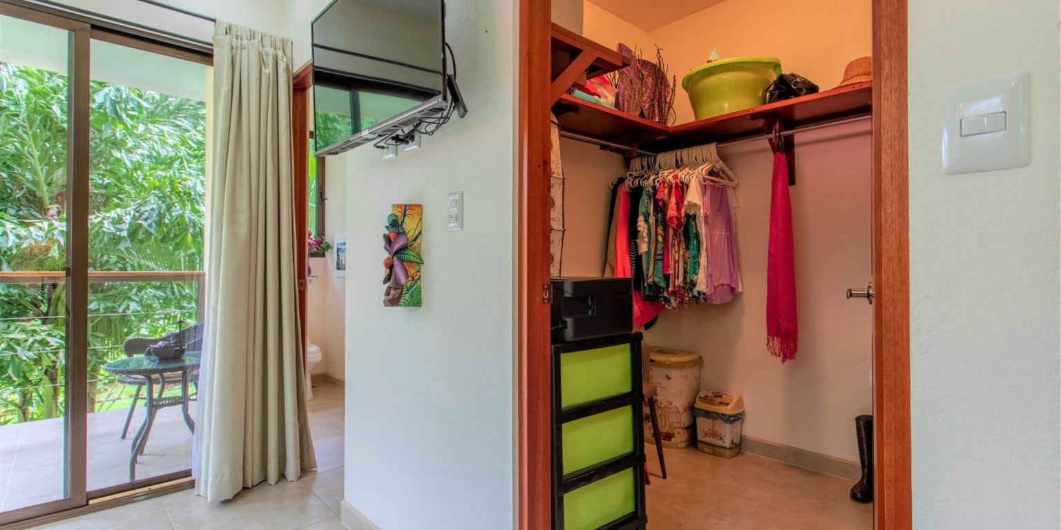 17. Master Closet Two-Bedroom Jungle View Home in Gated Community with Community Waterfall & Pool in Tres Rios Costa Rica