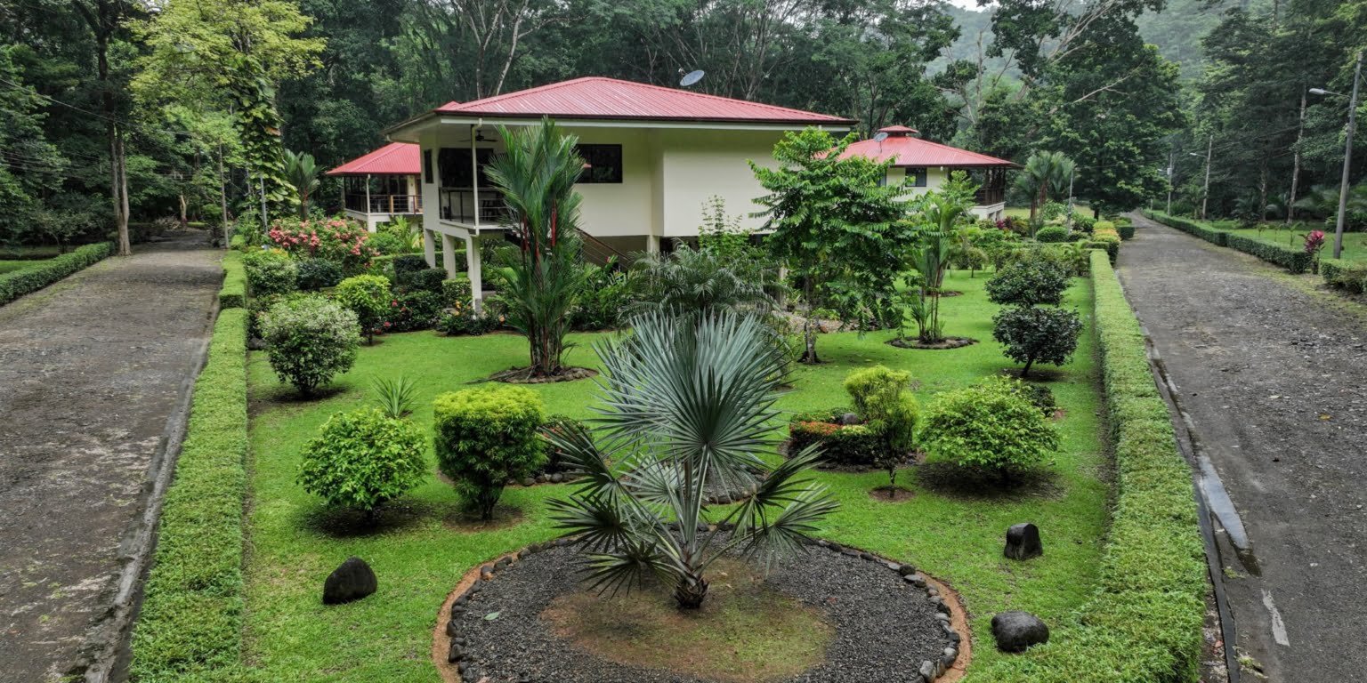 3. Drone Exterior Two-Bedroom Jungle View Home in Gated Community with Community Waterfall & Pool in Tres Rios Costa Rica