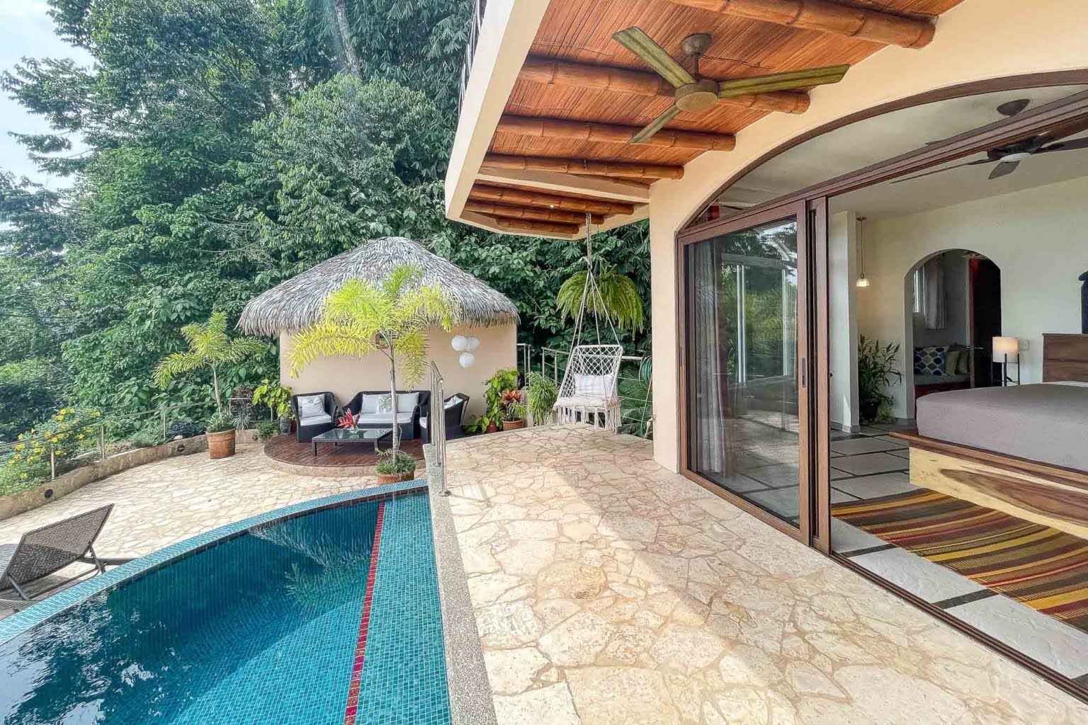 principal bed 1_2 Tropical Luxury 9-Bedroom Home in Gated Community above Dominicalito Costa Rica