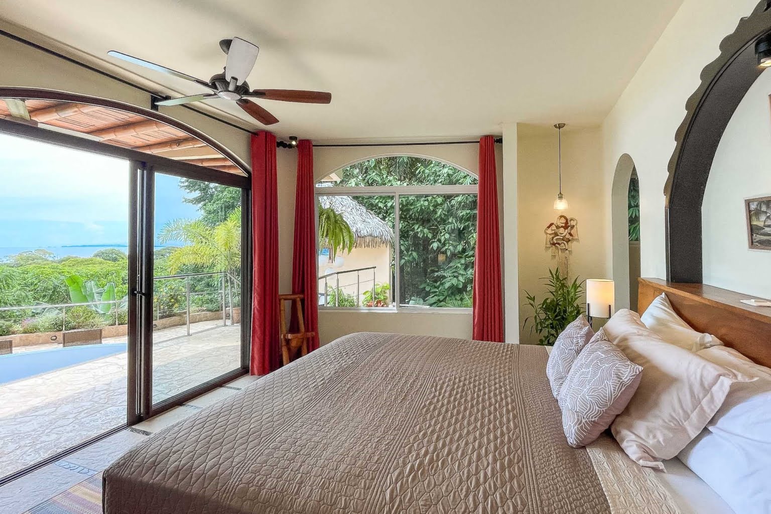 principal bed 1_1 Tropical Luxury 9-Bedroom Home in Gated Community above Dominicalito Costa Rica
