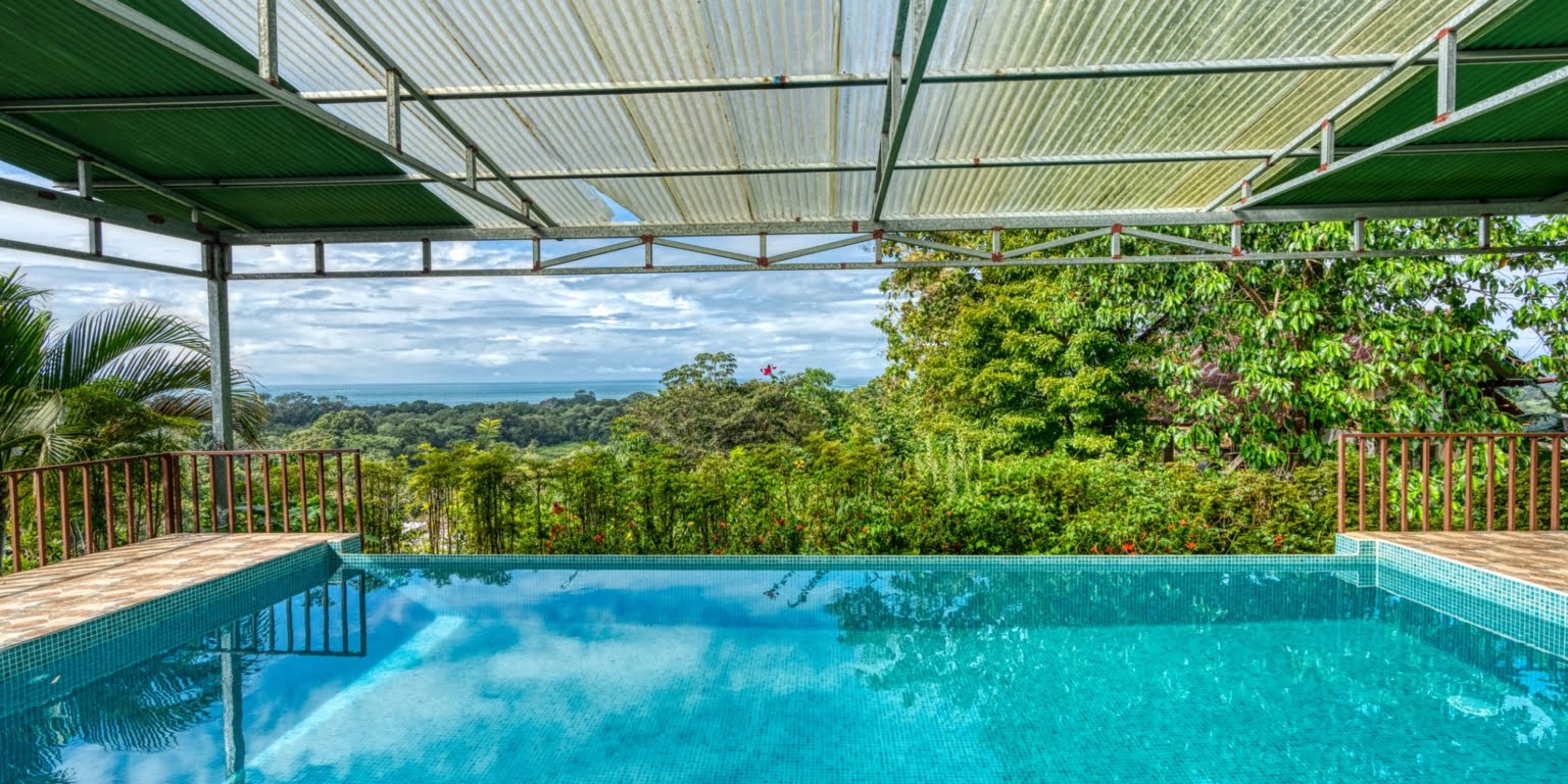 Lot-44 Easy Access Ocean View Lot in Uvita with Existing Simple Casita, Rancho & Pool and Ready to Build more in Uvita Costa Rica