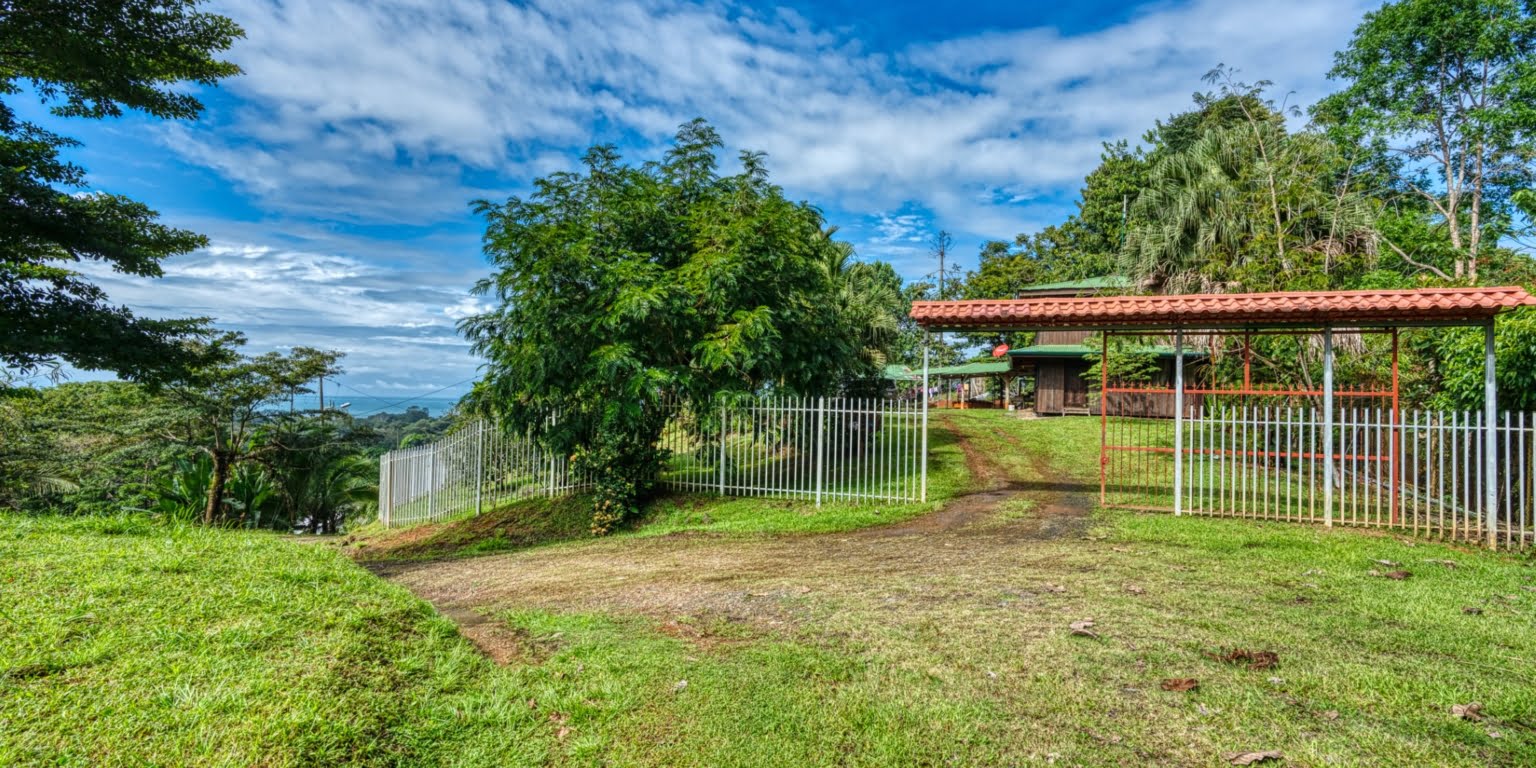 Lot-41 Easy Access Ocean View Lot in Uvita with Existing Simple Casita, Rancho & Pool and Ready to Build more in Uvita Costa Rica