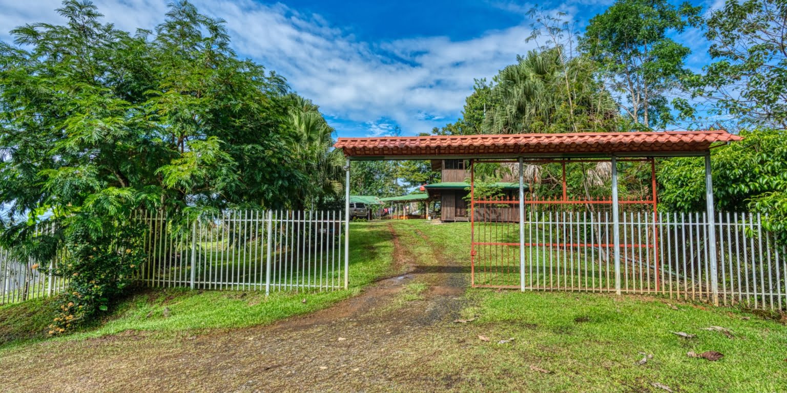 Lot-40 Easy Access Ocean View Lot in Uvita with Existing Simple Casita, Rancho & Pool and Ready to Build more in Uvita Costa Rica