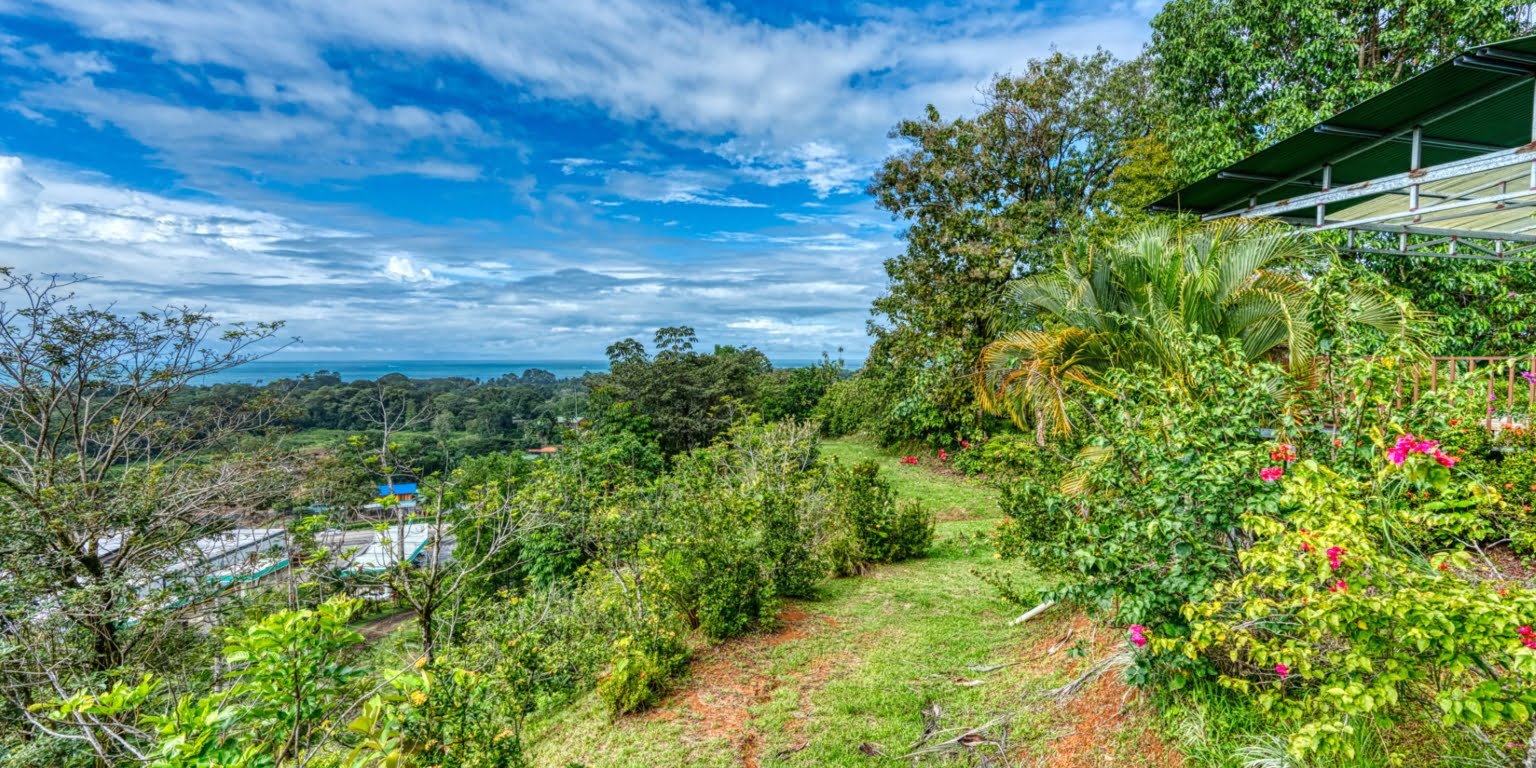 Lot-38 Easy Access Ocean View Lot in Uvita with Existing Simple Casita, Rancho & Pool and Ready to Build more in Uvita Costa Rica