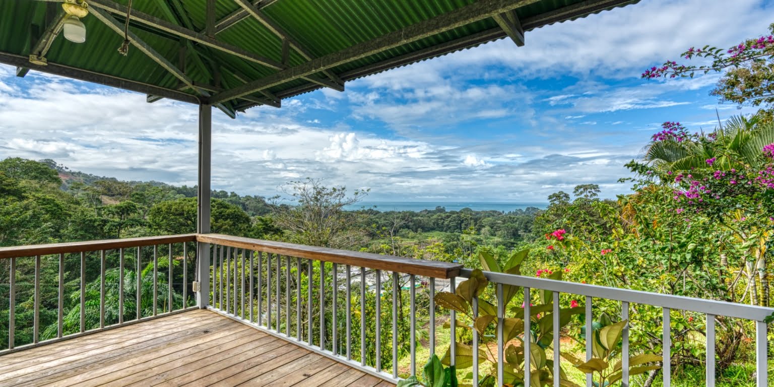 Lot-37 Easy Access Ocean View Lot in Uvita with Existing Simple Casita, Rancho & Pool and Ready to Build more in Uvita Costa Rica