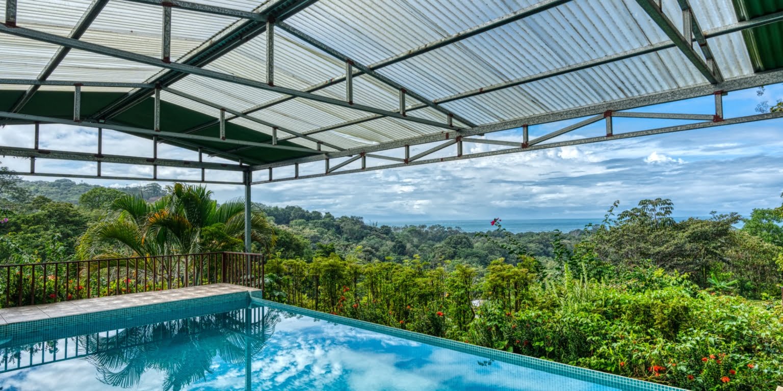 Lot-34 Easy Access Ocean View Lot in Uvita with Existing Simple Casita, Rancho & Pool and Ready to Build more in Uvita Costa Rica