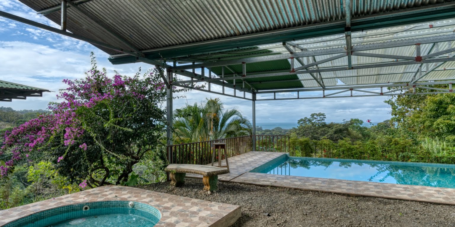 Lot-33 Easy Access Ocean View Lot in Uvita with Existing Simple Casita, Rancho & Pool and Ready to Build more in Uvita Costa Rica
