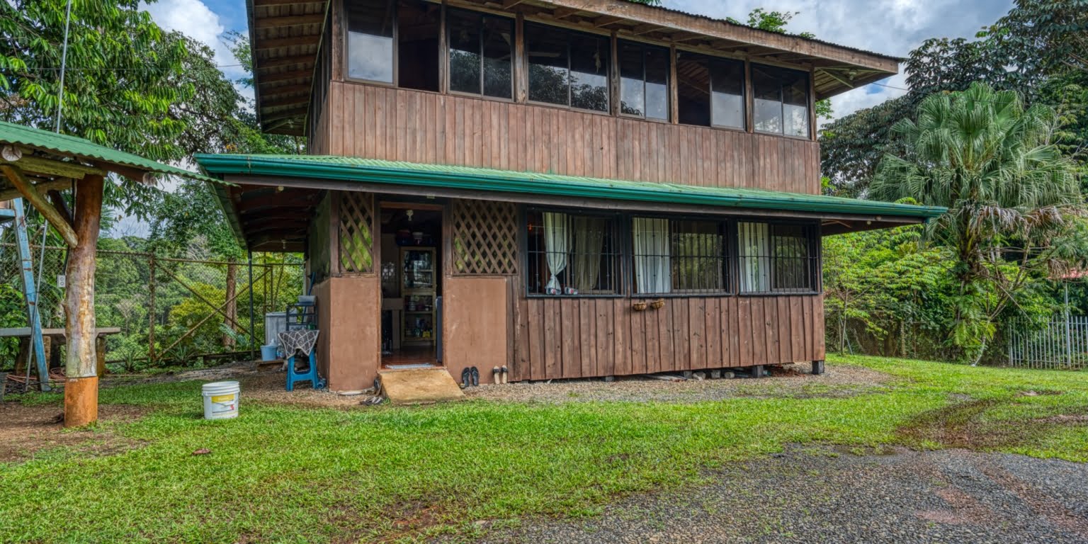 Lot-32 Easy Access Ocean View Lot in Uvita with Existing Simple Casita, Rancho & Pool and Ready to Build more in Uvita Costa Rica