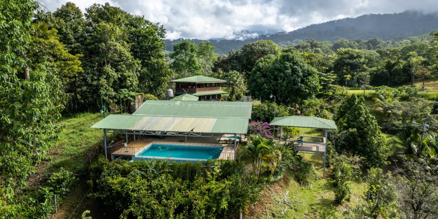 Lot-26 Easy Access Ocean View Lot in Uvita with Existing Simple Casita, Rancho & Pool and Ready to Build more in Uvita Costa Rica
