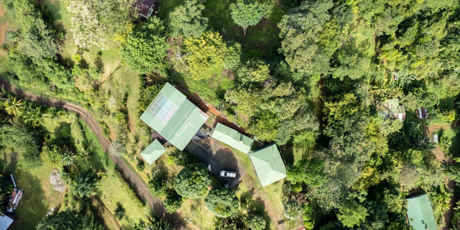 Lot-21 Easy Access Ocean View Lot in Uvita with Existing Simple Casita, Rancho & Pool and Ready to Build more in Uvita Costa Rica