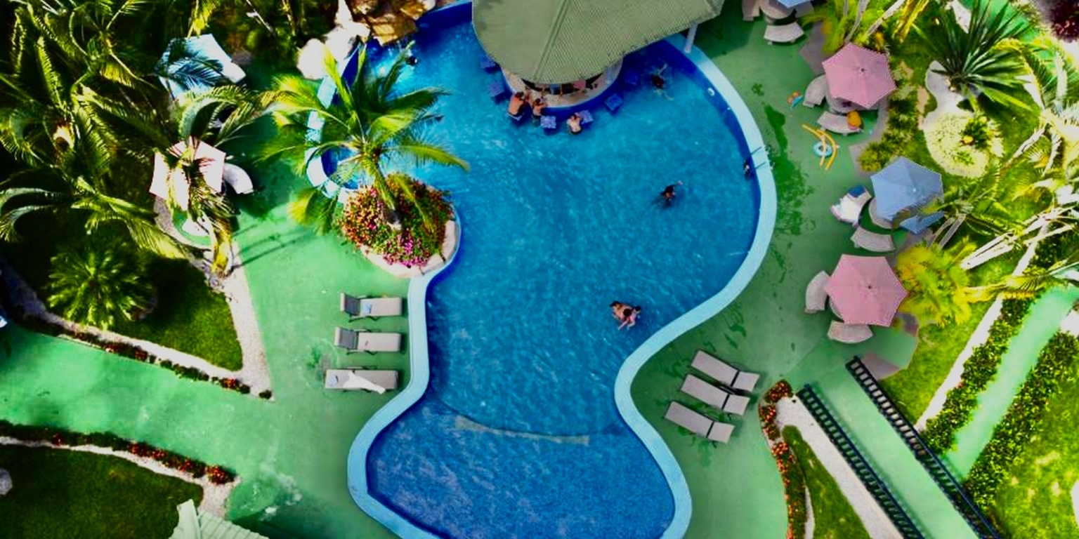 db5cf5f9-7d5b-4bf2-8475-d3d0f1325fa8 Stunning, Iconic 16-Room Hotel, Fully Remodeled with Restaurant, Pool & Rive plus Room to Build More in San Isidro Costa Rica