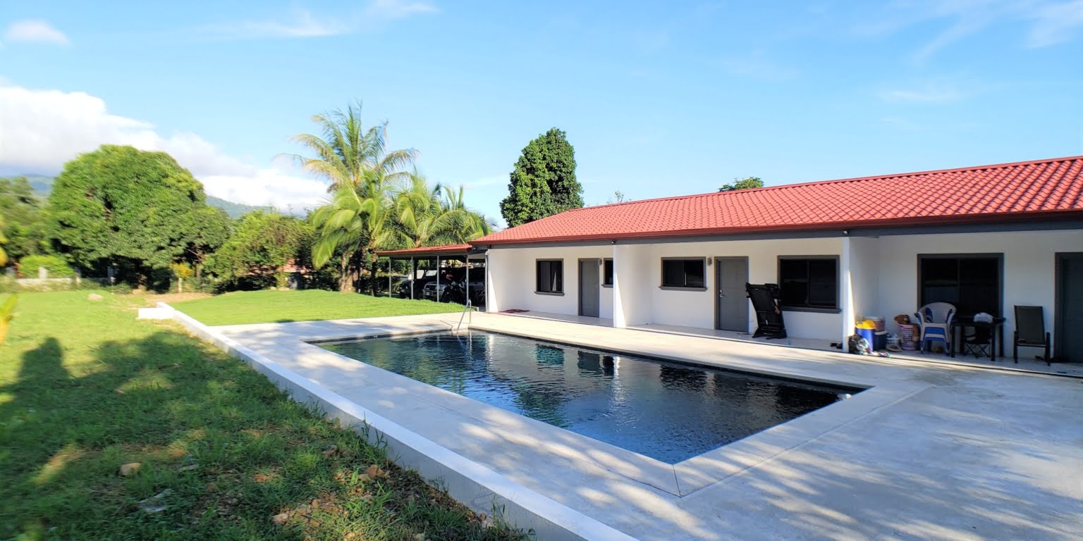 e9 Income Property with a 2-Bedroom Owner House & 3 2-Bedroom Apartments in the Heart of Ojochal Costa Rica
