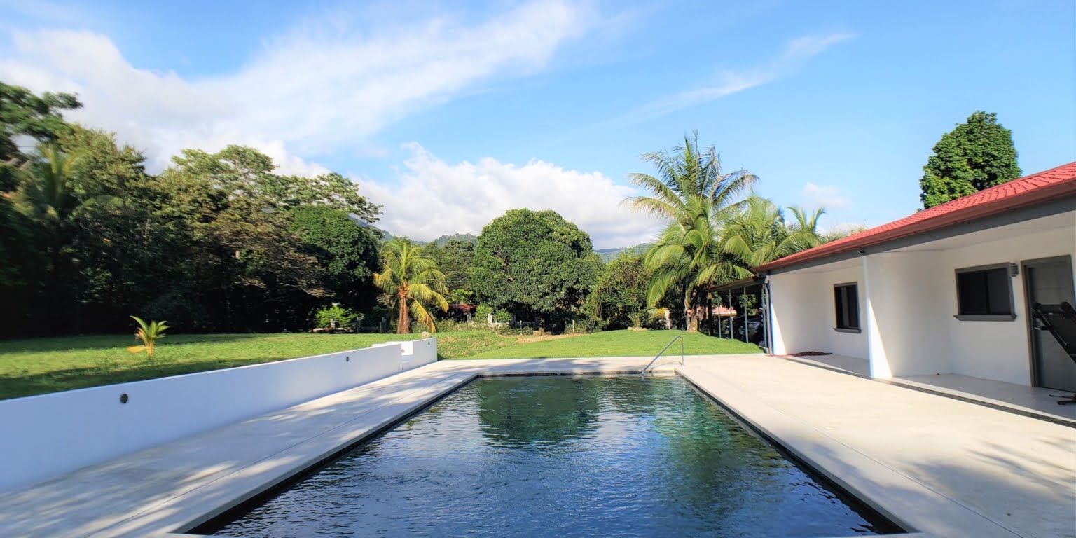 e5 Income Property with a 2-Bedroom Owner House & 3 2-Bedroom Apartments in the Heart of Ojochal Costa Rica