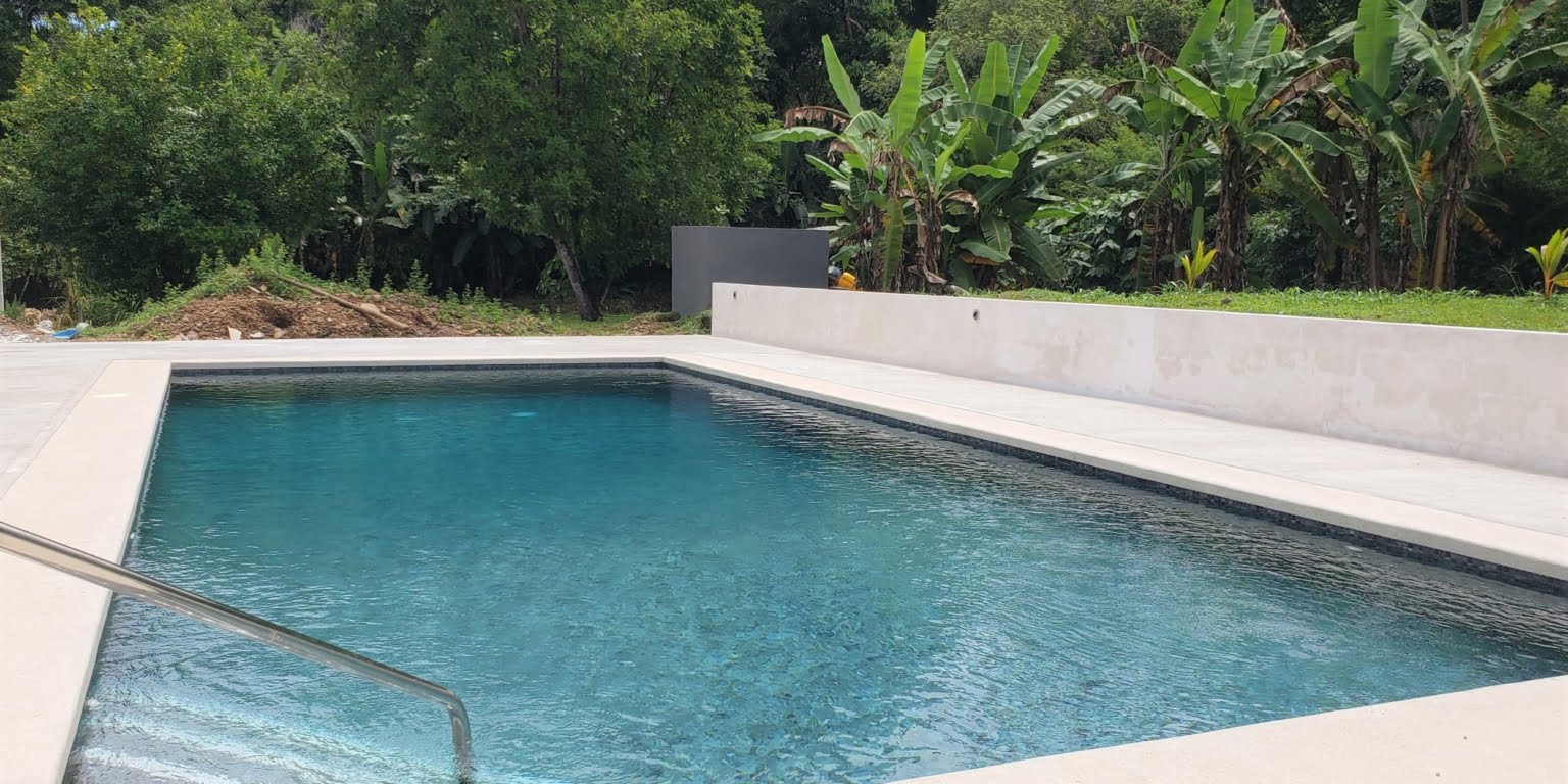 e8 Income Property with a 2-Bedroom Owner House & 3 2-Bedroom Apartments in the Heart of Ojochal Costa Rica