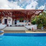 Expansive Oceanview from this 4-Bedroom Home with Big Pool In Ojochal Costa Rica