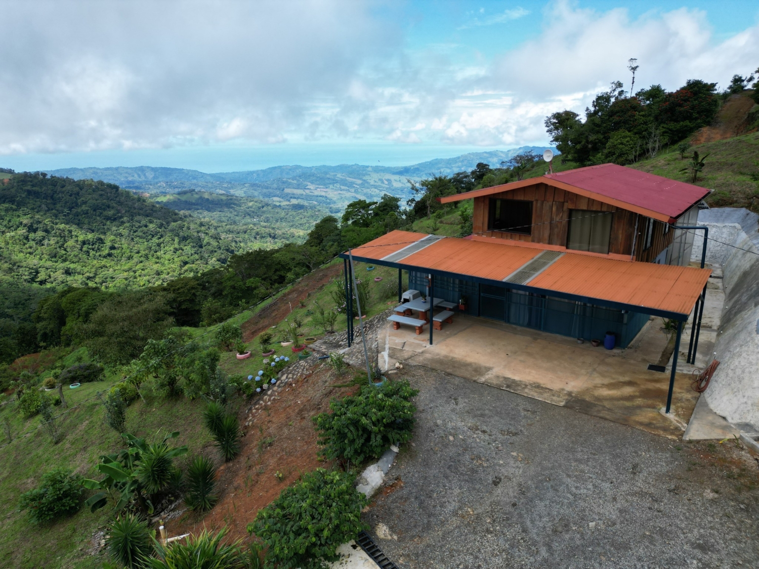 Josue Navarro 08 Incredible Mountain & Ocean Views with Two Cabins, Many Fruit Trees & More Building Areas on Top of the Mountains in Tinamastes Costa Rica