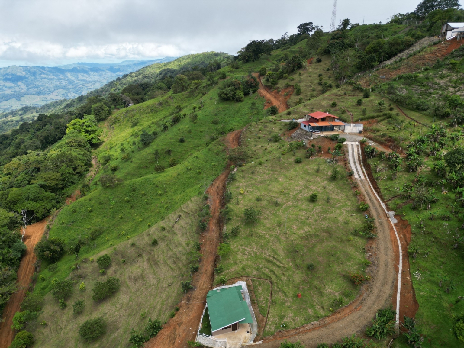 Josue Navarro 04 Incredible Mountain & Ocean Views with Two Cabins, Many Fruit Trees & More Building Areas on Top of the Mountains in Tinamastes Costa Rica