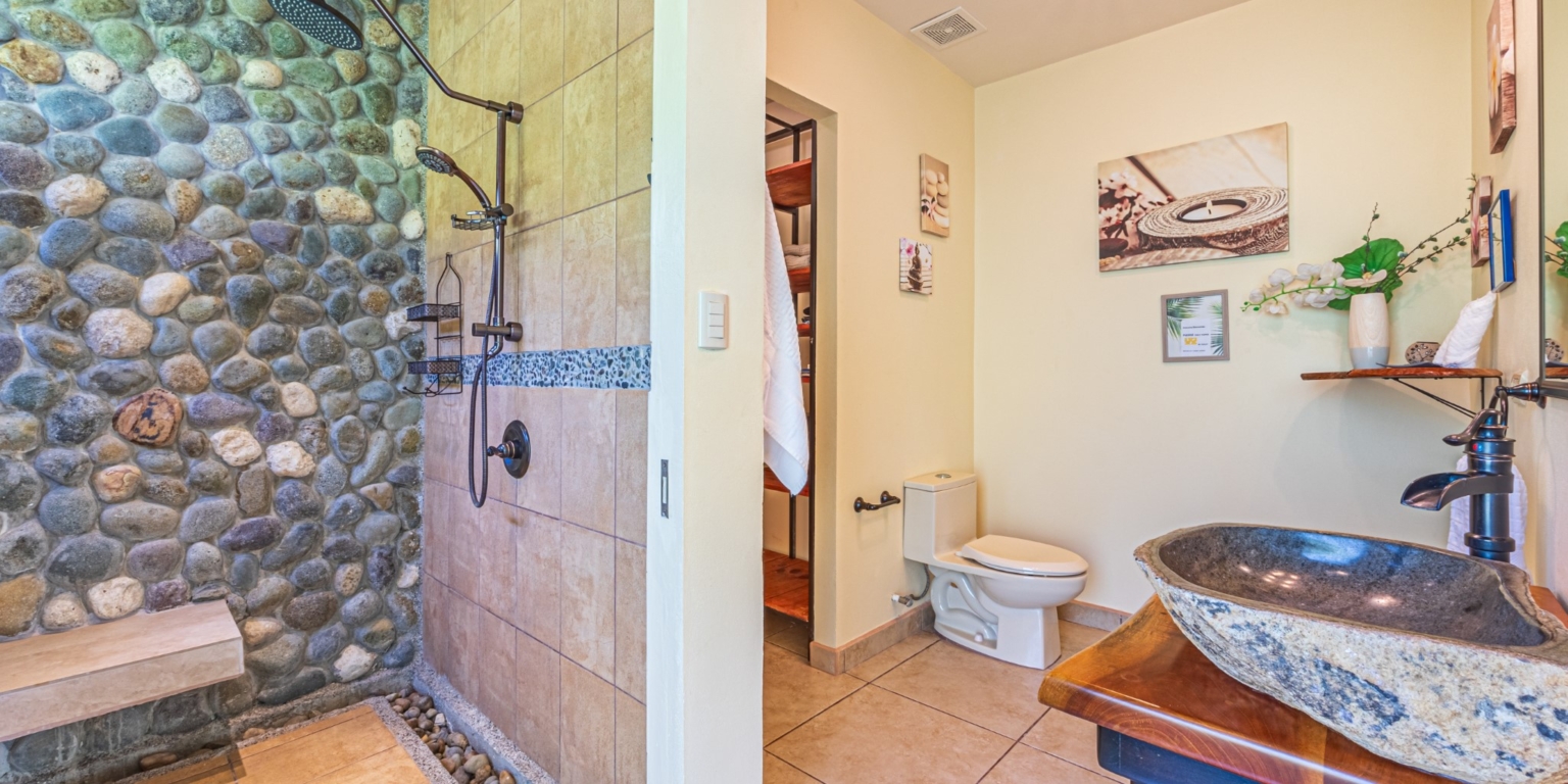 Invest in this Solid 4-Bedroom Home with Possible ROI from Renting out the Home & Guest Houses in Portalon near Dominical Costa Rica