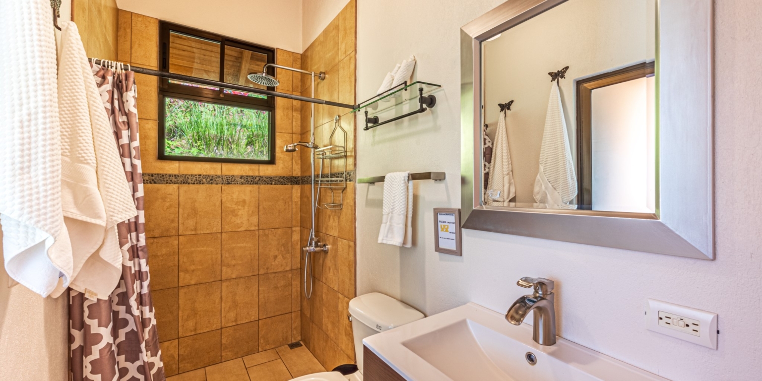 Invest in this Solid 4-Bedroom Home with Possible ROI from Renting out the Home & Guest Houses in Portalon near Dominical Costa Rica