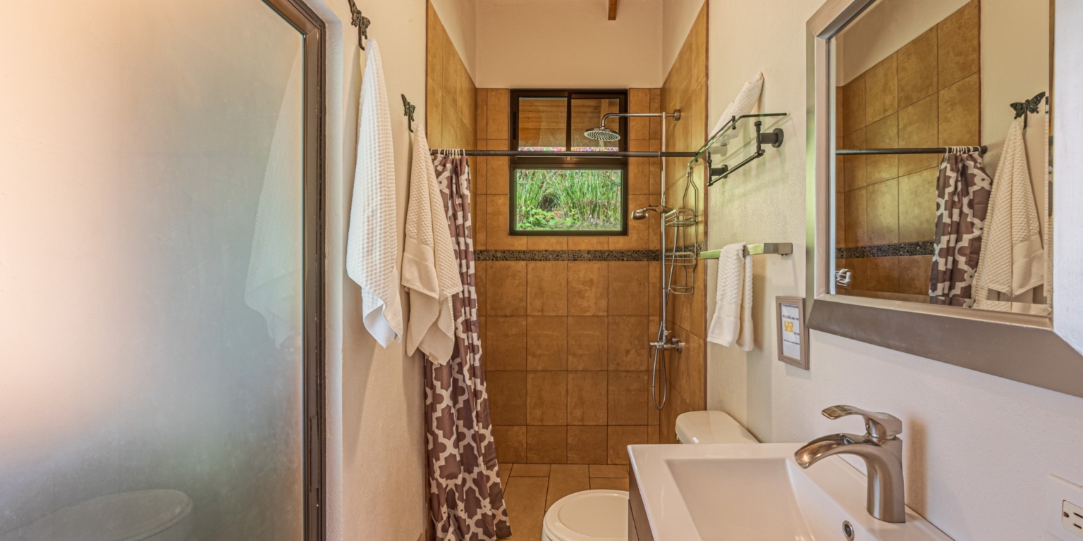 Invest in this Solid 4-Bedroom Home with Possible ROI from Renting out the Home & Guest Houses in Portalon near Dominical Costa Rica