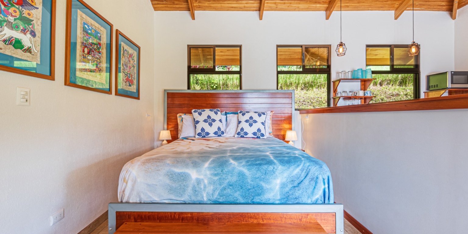Invest in this Solid 4-Bedroom Home with Possible ROI from Renting out the Home & Guest Houses in Portalon near Dominical Costa Rica