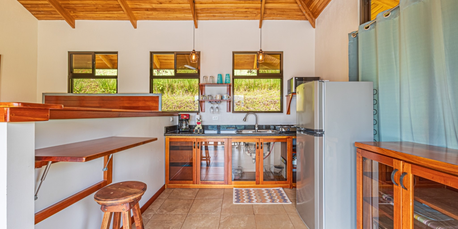 Invest in this Solid 4-Bedroom Home with Possible ROI from Renting out the Home & Guest Houses in Portalon near Dominical Costa Rica