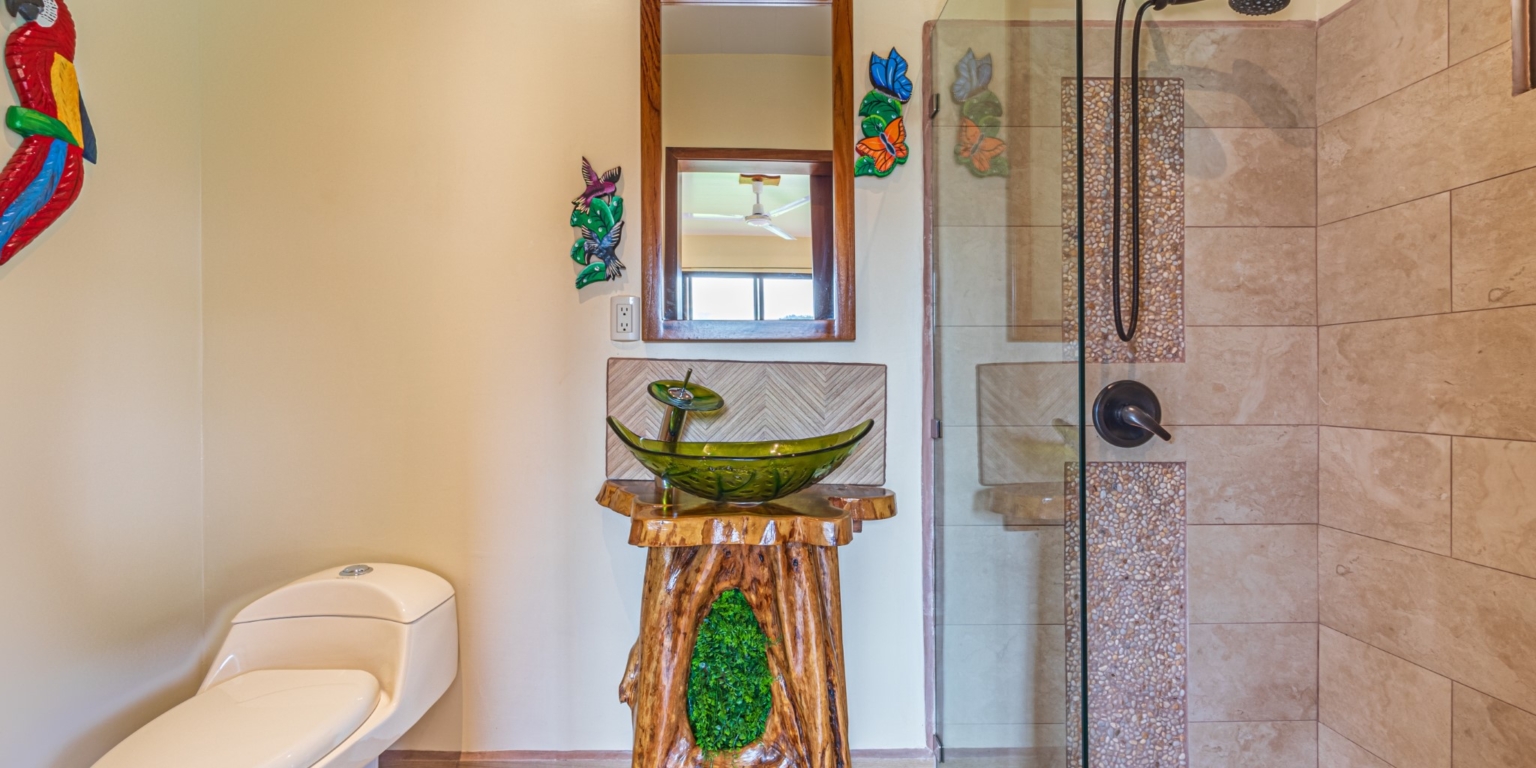 Invest in this Solid 4-Bedroom Home with Possible ROI from Renting out the Home & Guest Houses in Portalon near Dominical Costa Rica