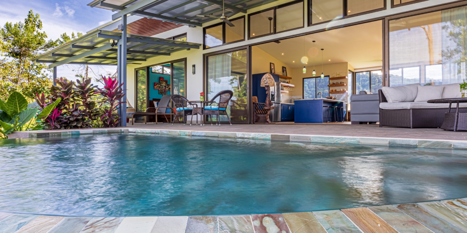 Invest in this Solid 4-Bedroom Home with Possible ROI from Renting out the Home & Guest Houses in Portalon near Dominical Costa Rica