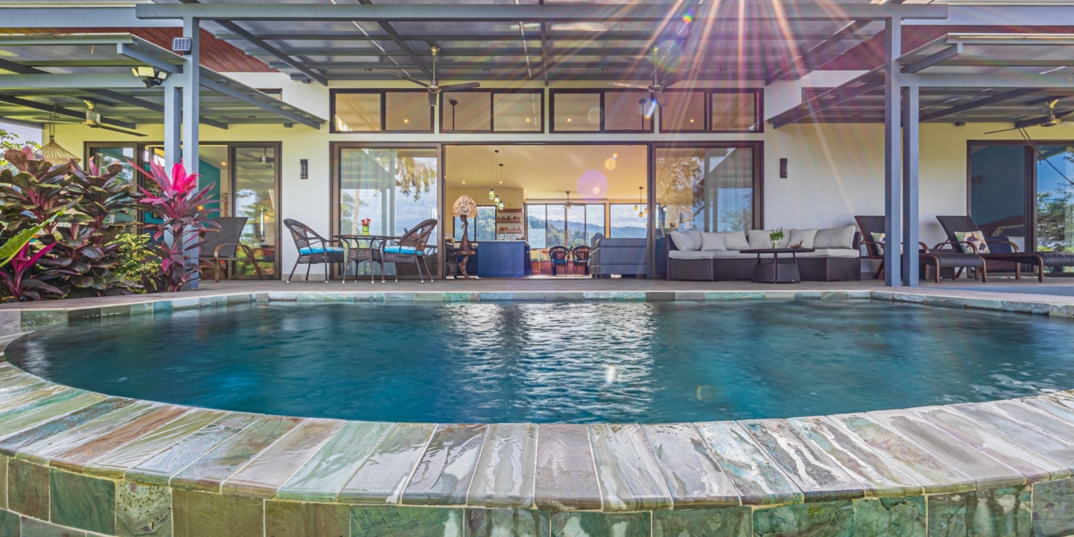 Invest in this Solid 4-Bedroom Home with Possible ROI from Renting out the Home & Guest Houses in Portalon near Dominical Costa Rica
