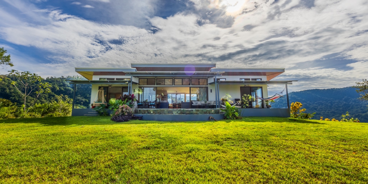 Invest in this Solid 4-Bedroom Home with Possible ROI from Renting out the Home & Guest Houses in Portalon near Dominical Costa Rica
