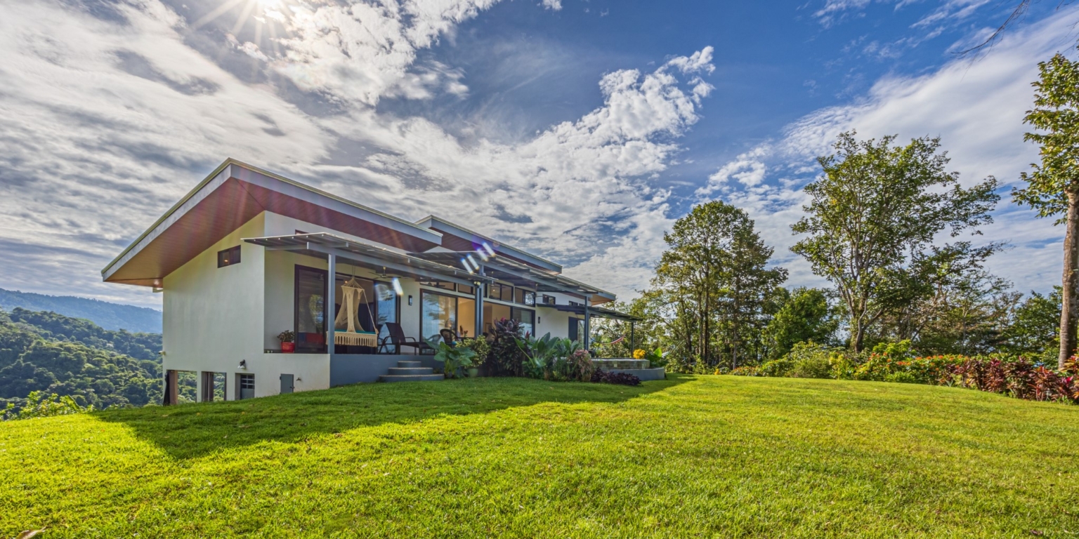 Invest in this Solid 4-Bedroom Home with Possible ROI from Renting out the Home & Guest Houses in Portalon near Dominical Costa Rica