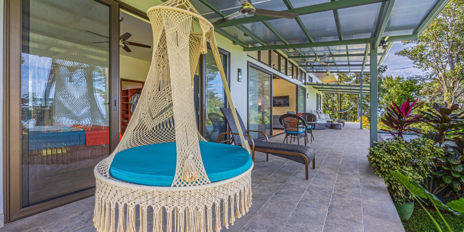 Invest in this Solid 4-Bedroom Home with Possible ROI from Renting out the Home & Guest Houses in Portalon near Dominical Costa Rica