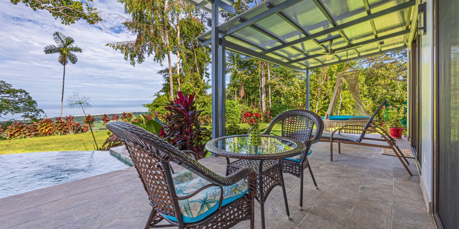 Invest in this Solid 4-Bedroom Home with Possible ROI from Renting out the Home & Guest Houses in Portalon near Dominical Costa Rica