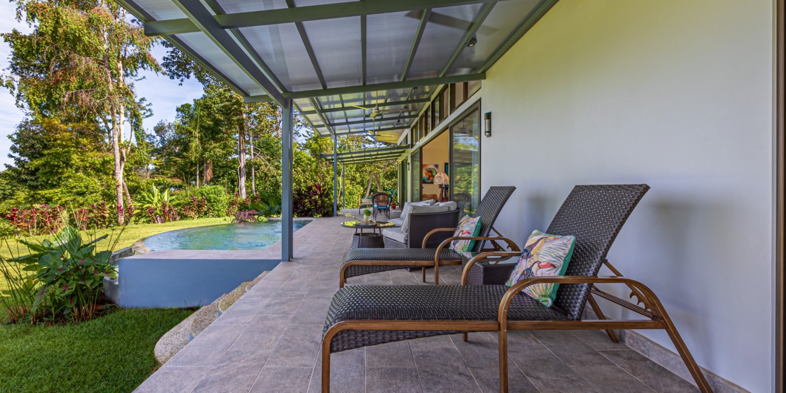 Invest in this Solid 4-Bedroom Home with Possible ROI from Renting out the Home & Guest Houses in Portalon near Dominical Costa Rica