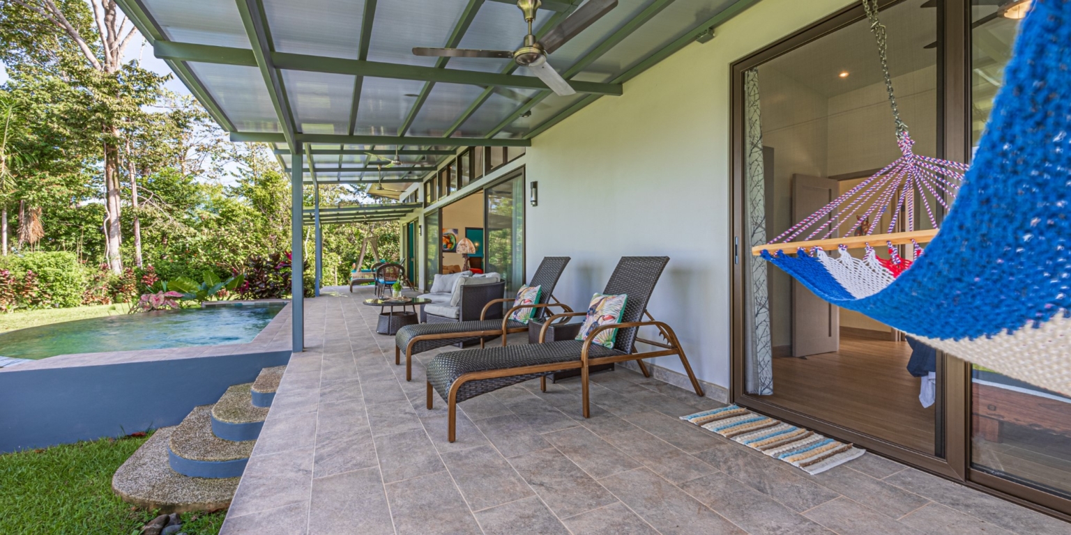 Invest in this Solid 4-Bedroom Home with Possible ROI from Renting out the Home & Guest Houses in Portalon near Dominical Costa Rica