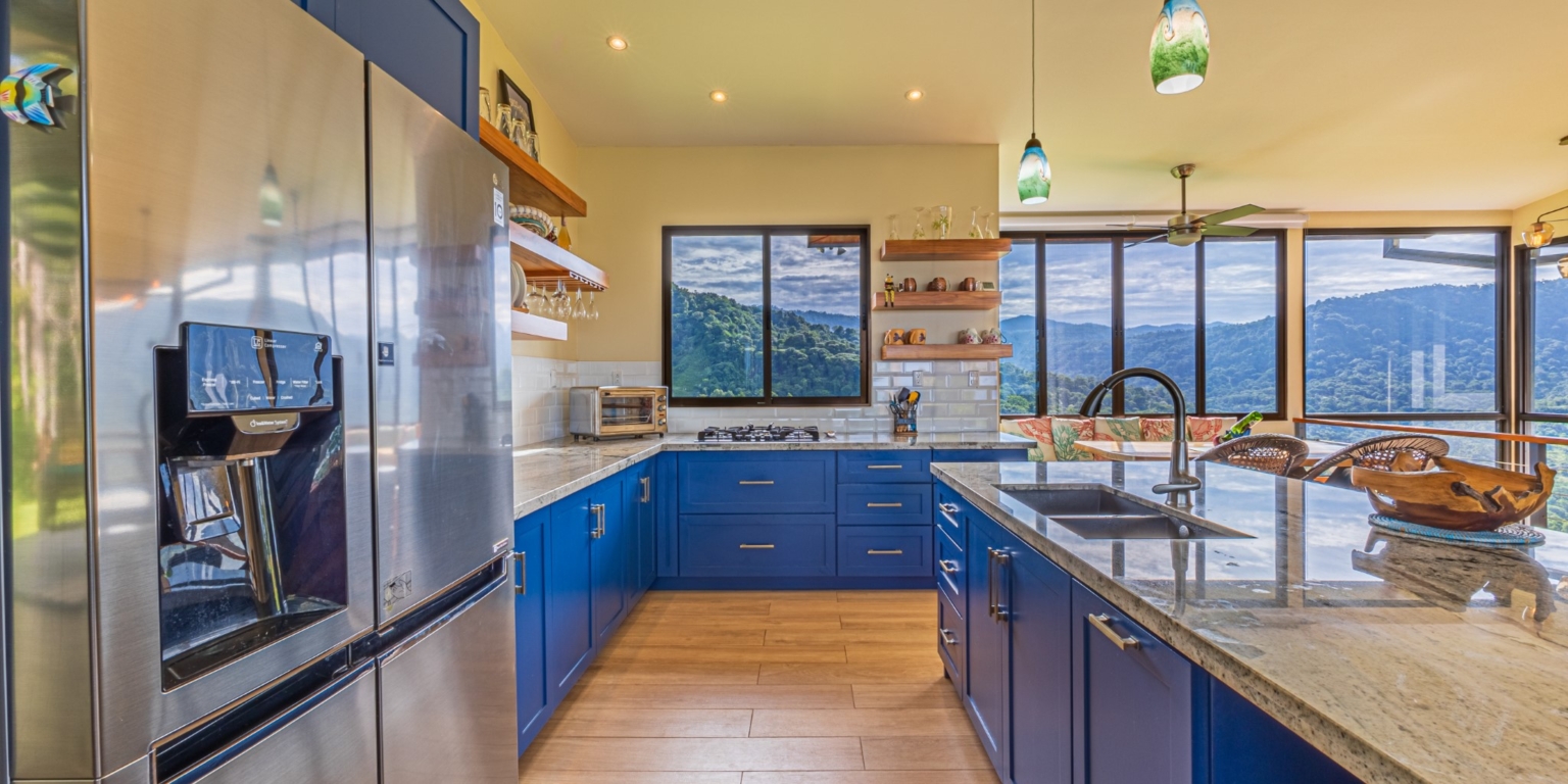 Invest in this Solid 4-Bedroom Home with Possible ROI from Renting out the Home & Guest Houses in Portalon near Dominical Costa Rica