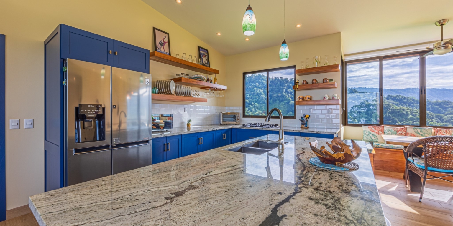 Invest in this Solid 4-Bedroom Home with Possible ROI from Renting out the Home & Guest Houses in Portalon near Dominical Costa Rica