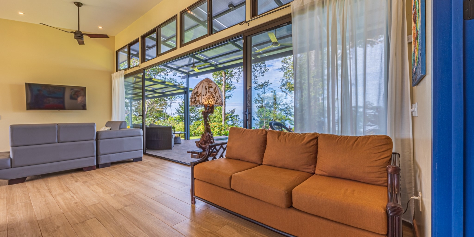 Invest in this Solid 4-Bedroom Home with Possible ROI from Renting out the Home & Guest Houses in Portalon near Dominical Costa Rica