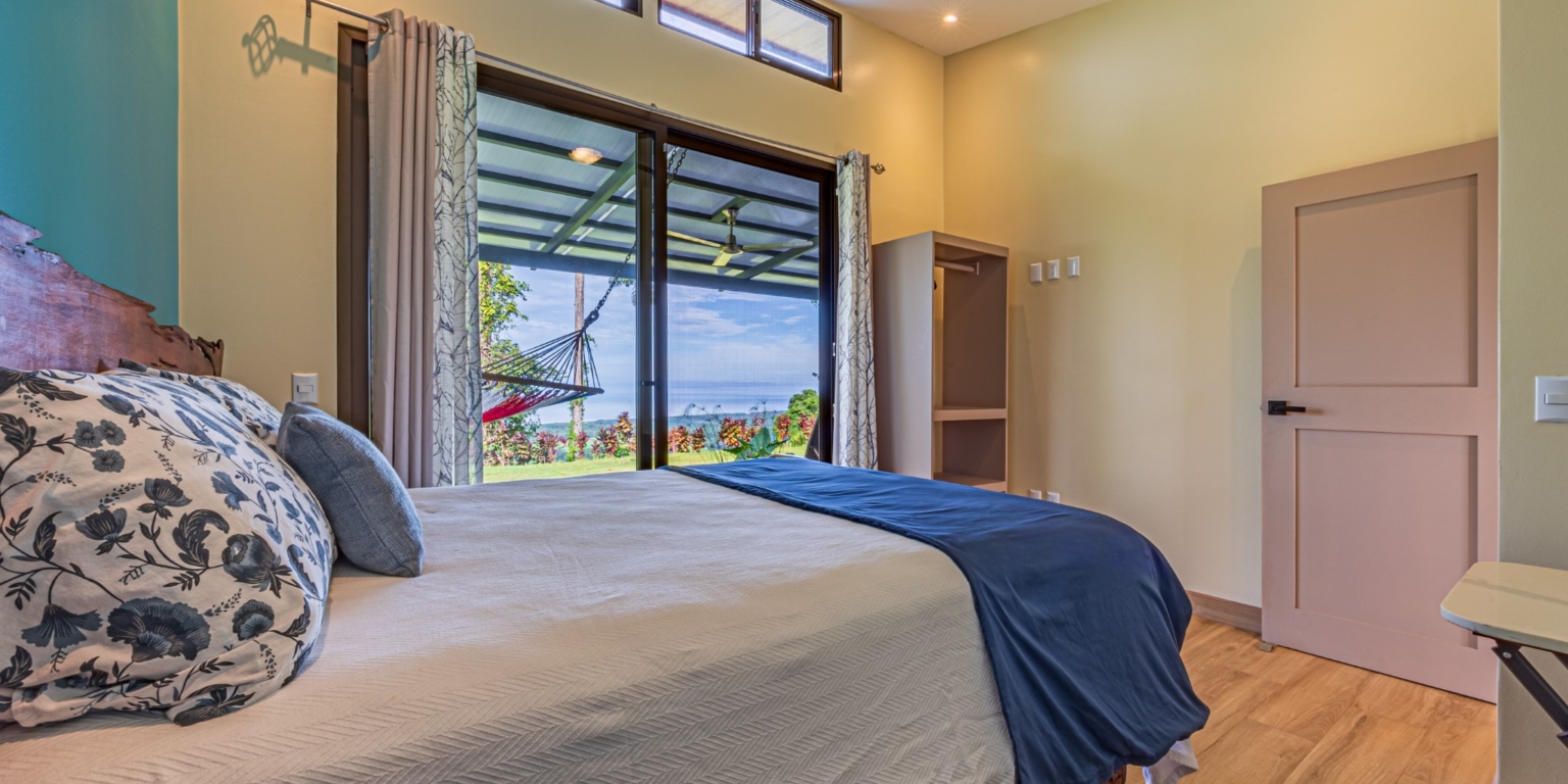Invest in this Solid 4-Bedroom Home with Possible ROI from Renting out the Home & Guest Houses in Portalon near Dominical Costa Rica
