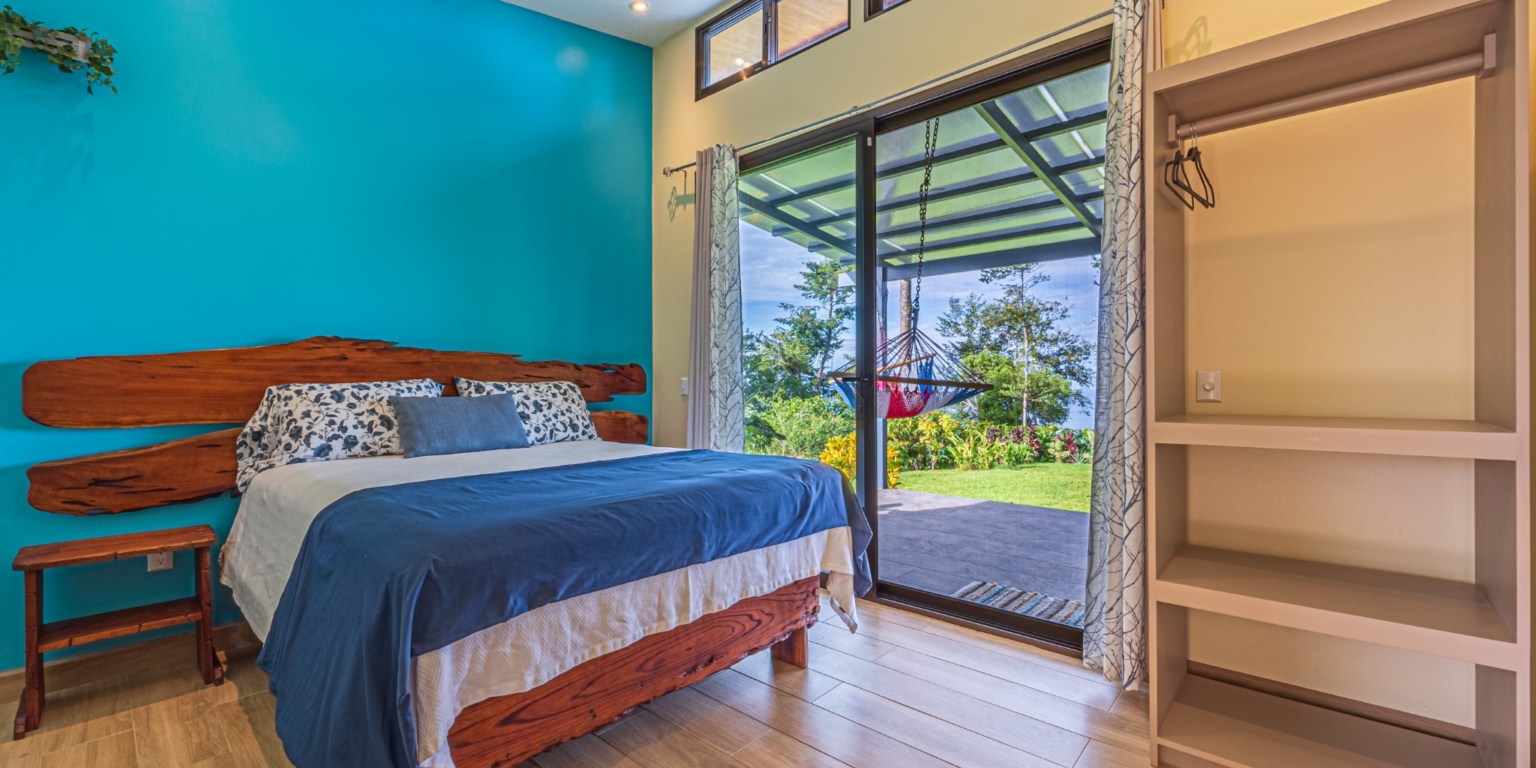 Invest in this Solid 4-Bedroom Home with Possible ROI from Renting out the Home & Guest Houses in Portalon near Dominical Costa Rica