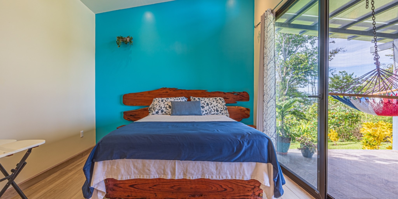 Invest in this Solid 4-Bedroom Home with Possible ROI from Renting out the Home & Guest Houses in Portalon near Dominical Costa Rica