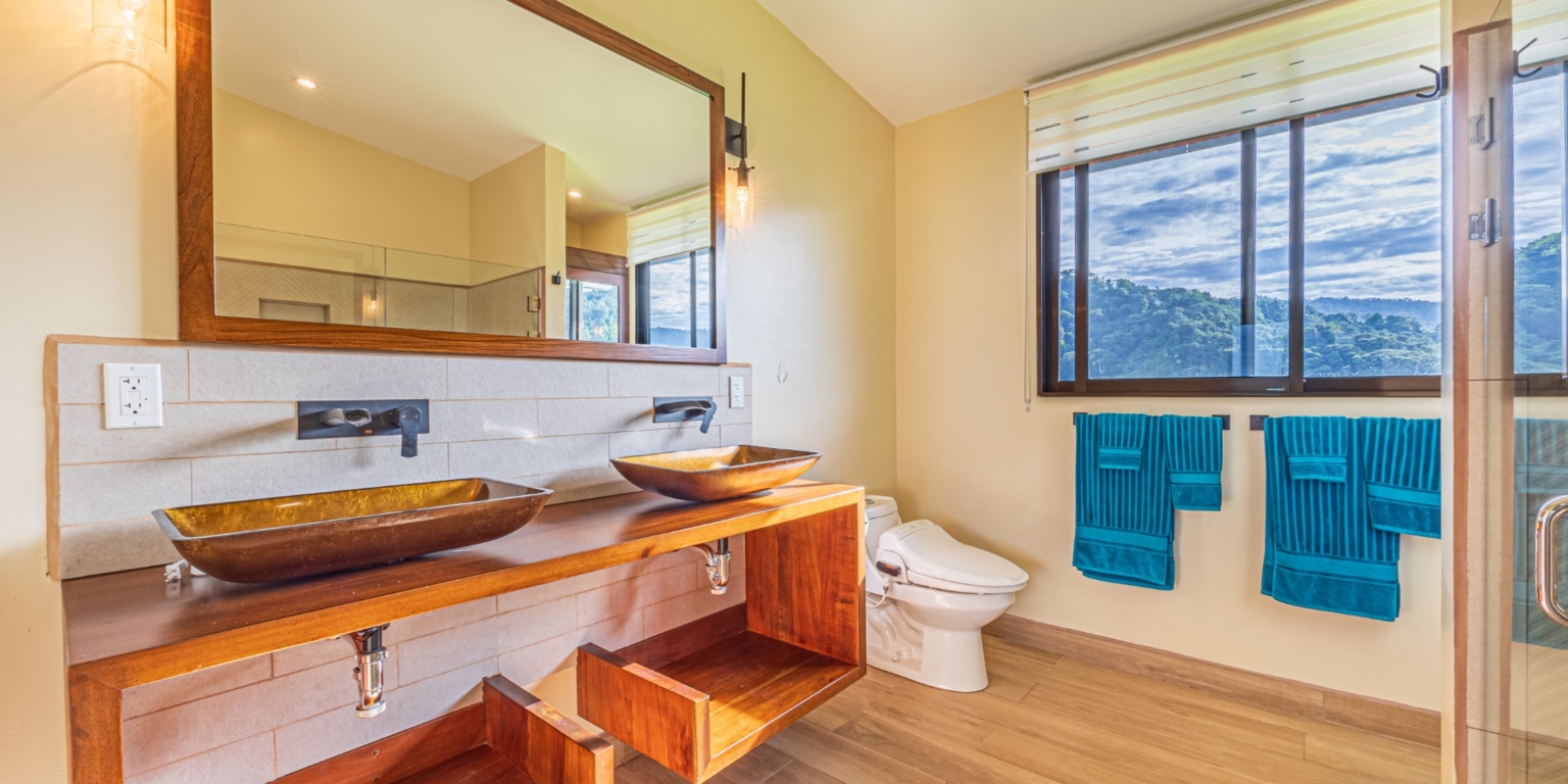 Invest in this Solid 4-Bedroom Home with Possible ROI from Renting out the Home & Guest Houses in Portalon near Dominical Costa Rica