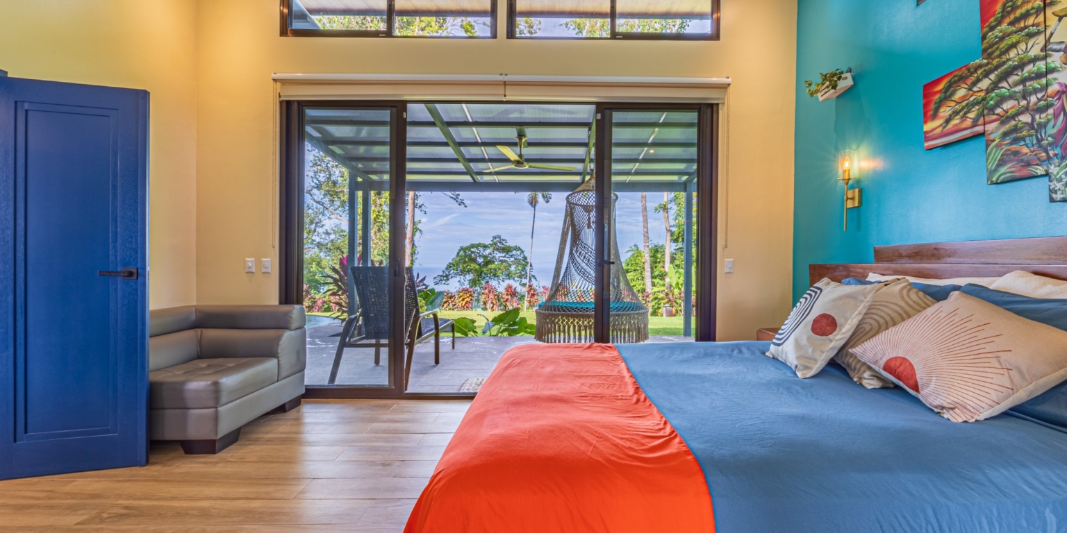 Invest in this Solid 4-Bedroom Home with Possible ROI from Renting out the Home & Guest Houses in Portalon near Dominical Costa Rica