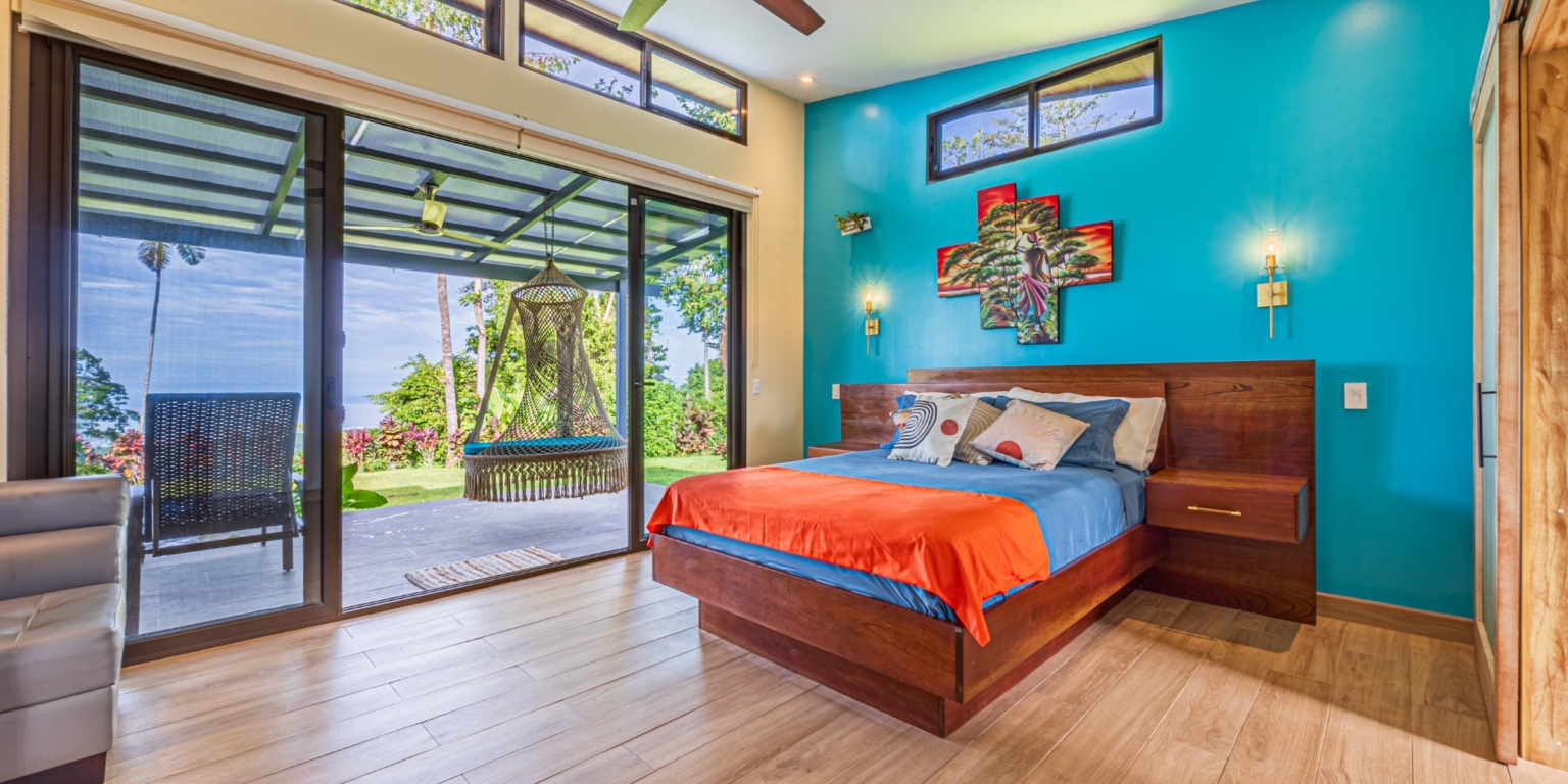 Invest in this Solid 4-Bedroom Home with Possible ROI from Renting out the Home & Guest Houses in Portalon near Dominical Costa Rica