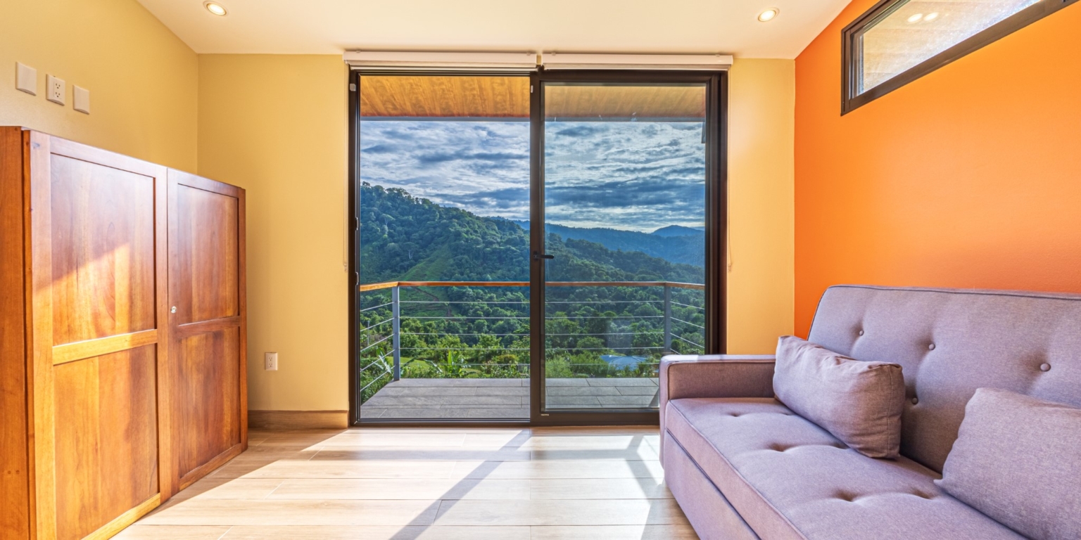 Invest in this Solid 4-Bedroom Home with Possible ROI from Renting out the Home & Guest Houses in Portalon near Dominical Costa Rica