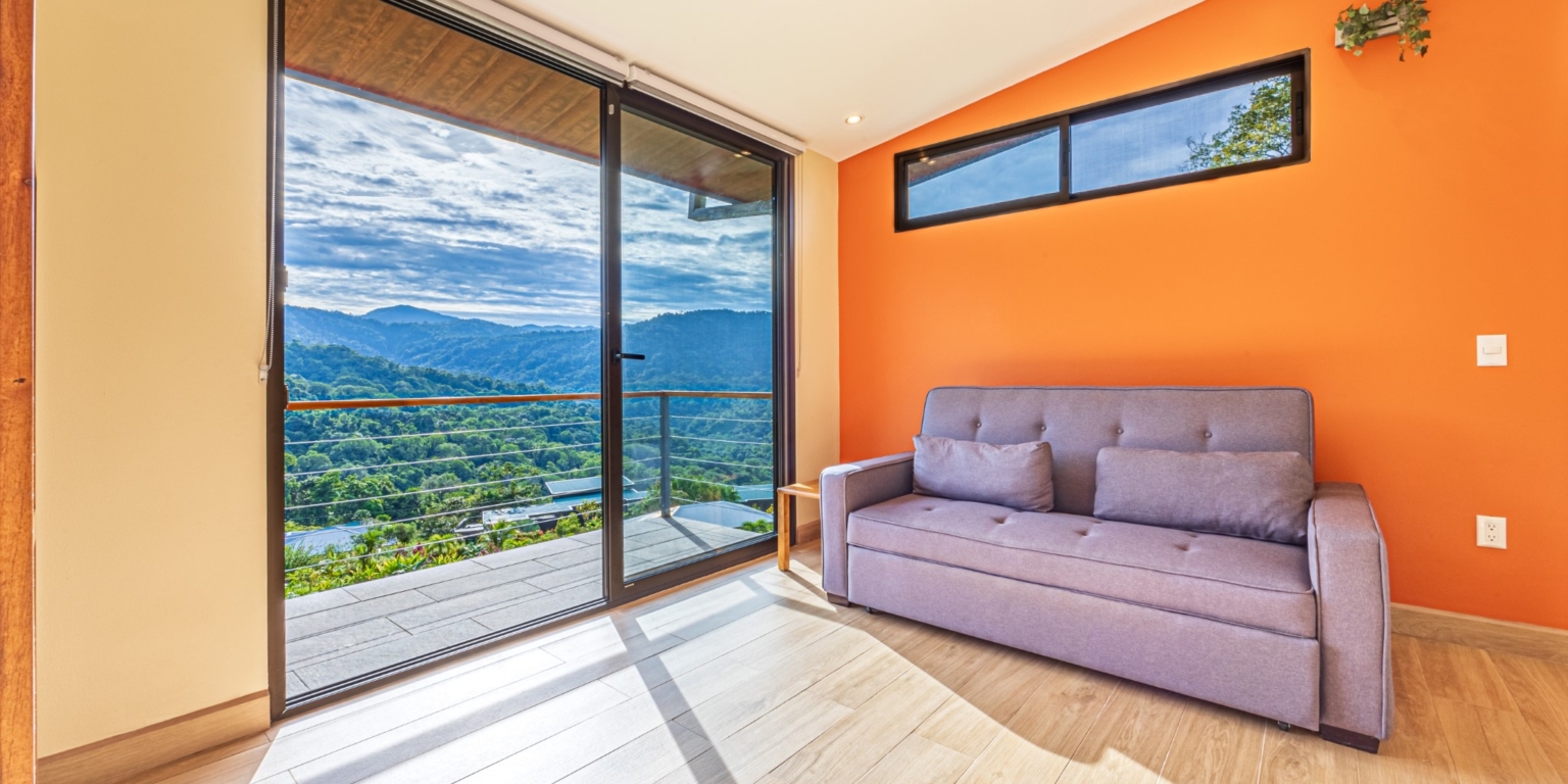 Invest in this Solid 4-Bedroom Home with Possible ROI from Renting out the Home & Guest Houses in Portalon near Dominical Costa Rica