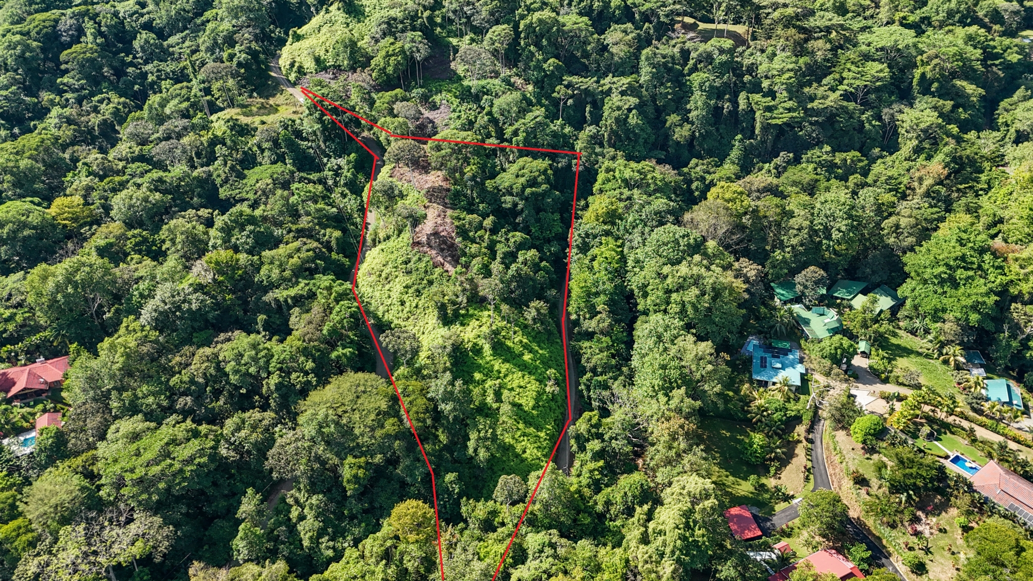 Ridgetop Land with 2.3 Acres with Jungle & Mountain Views in Desirable Finca Marañon in Ojochal Costa Rica